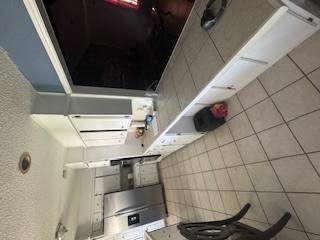 Kitchen before - tile countertops